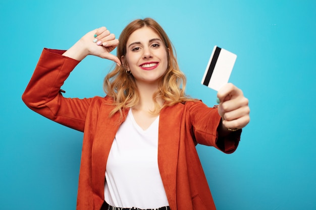 Premium Photo | Young pretty blonde woman with credit card