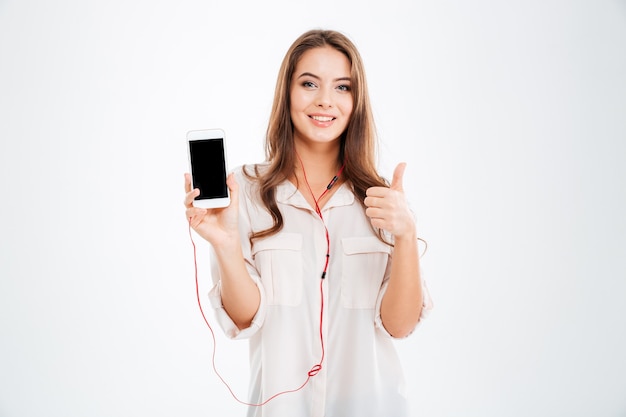 Premium Photo | Young pretty cute girl with earphones listening music ...