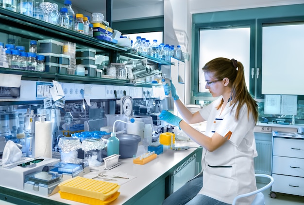 Young scientist works in modern laboratory Premium Photo