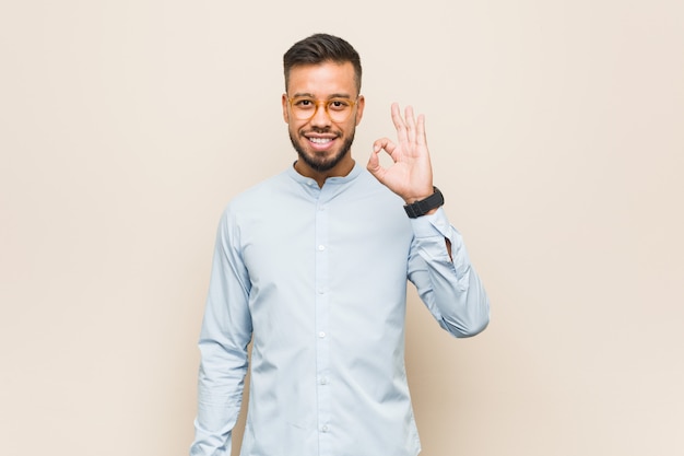 Premium Photo | Young south-asian business man cheerful and confident ...