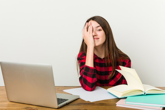 Premium Photo | Young teenager going back to her routine doing homework ...