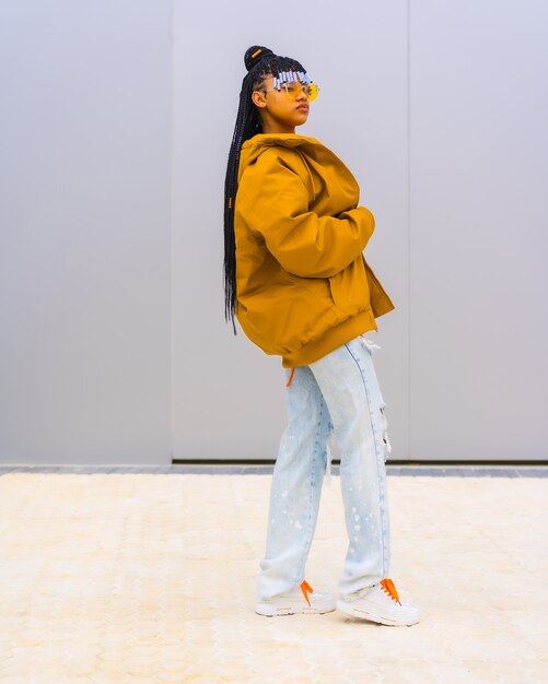 Premium Photo | A young trap dancer with braids. black ethnicity girl ...