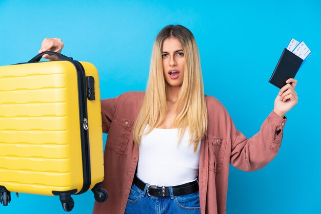 Premium Photo | Young uruguayan woman over isolated blue wall unhappy ...