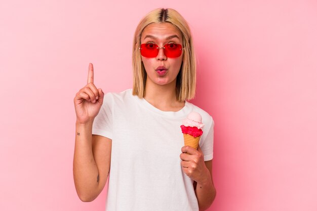 Premium Photo Young Venezuelan Woman Eating An Ice Cream Isolated On Pink Wall Having Some 