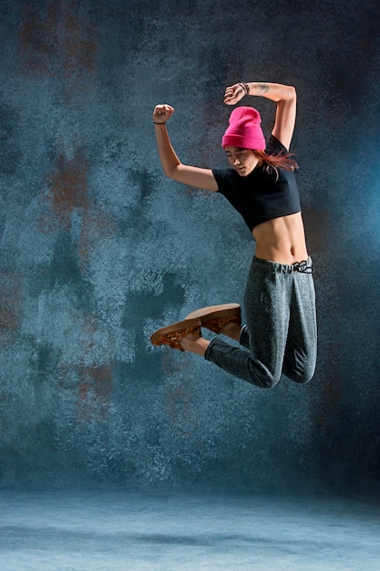 Free Photo | Young woman break dancing.