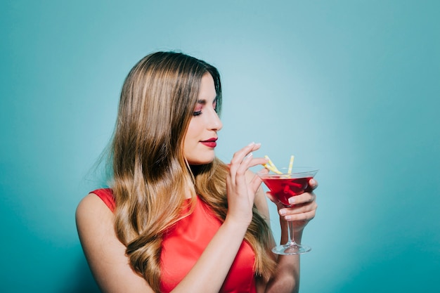 Free Photo | Young woman drinking cocktail