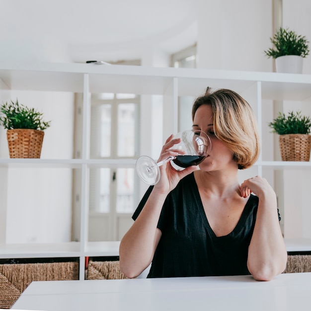 Free Photo | Young woman drinking wine