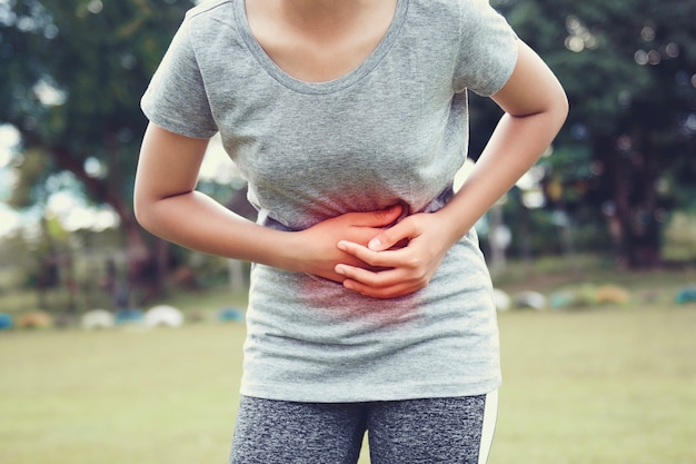 Premium Photo | Young woman having stomachache