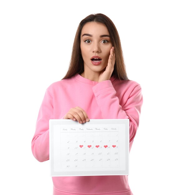 Premium Photo Young Woman Holding Calendar With Marked Menstrual
