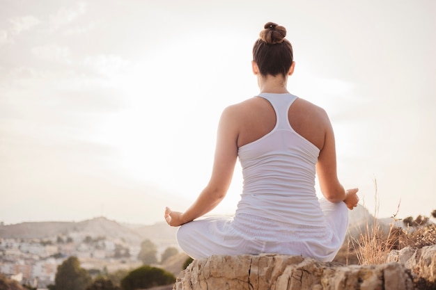 Free Photo | Young woman meditating