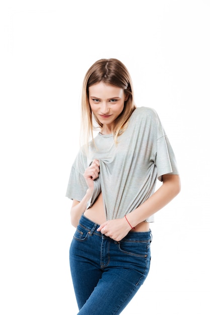 Free Photo Young Woman Seductively Looking And Lifting Shirt