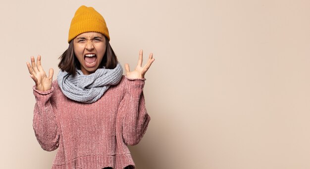 Premium Photo | Young woman shouting angrily