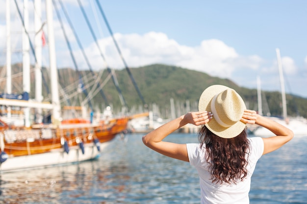 Free Photo | Young woman standing on port