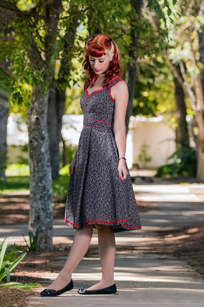 Premium Photo Young Woman With A Simple Spring Dress Posing On The Park