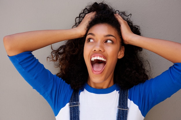 Premium Photo Young Woman With Surprised Expression On Face