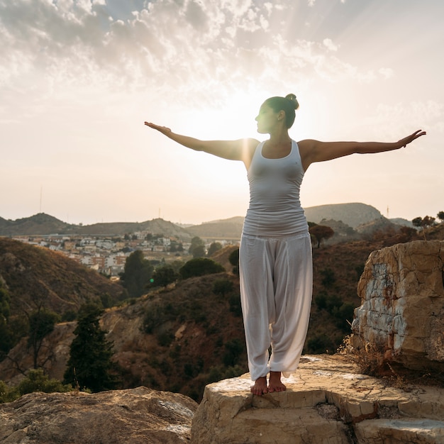 Free Photo Youngwoman Yoga Nature And Sunset