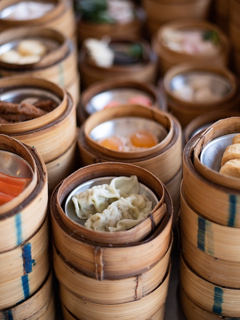 Premium Photo | Yumcha, dim sum in bamboo steamer, chinese cuisine