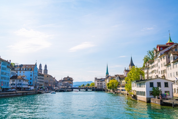 Zurich city center with famous fraumunster and grossmunster churches and river limmat Premium Photo