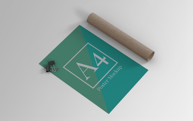 Download A4 poster mockup with binder clip and roll cardboard left view | Premium PSD File