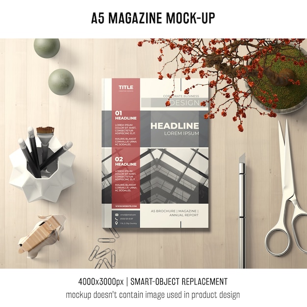 Download A5 magazine mockup with scissors | Free PSD File