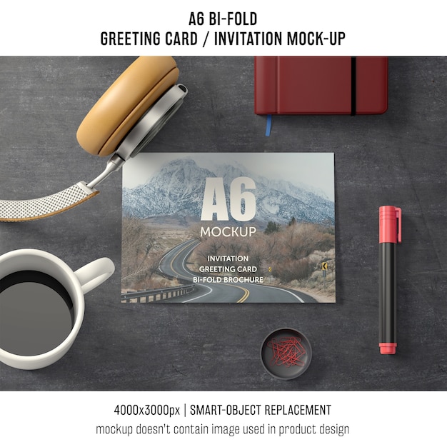 Download A6 bi-fold greeting card mockup with coffee | Free PSD File