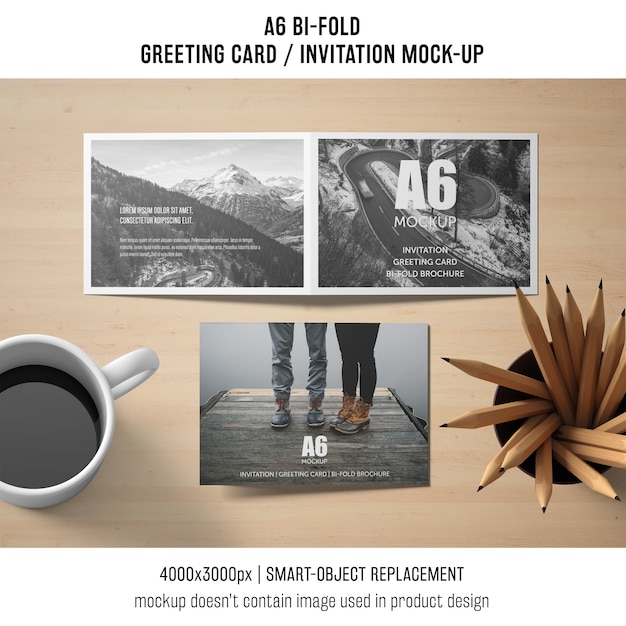 Download A6 bi-fold invitation card mockup with coffee | Free PSD File