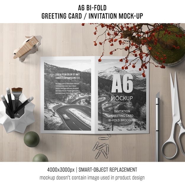Download Free Psd A6 Bi Fold Invitation Card Template With Scissors And Plant