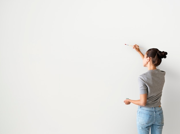 Premium Psd Artist Woman Painting The Wall