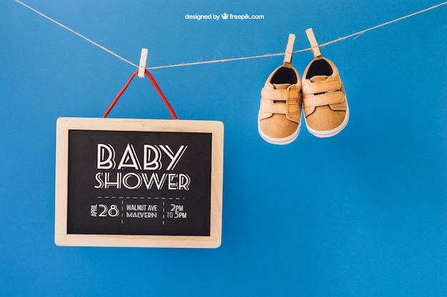 Download Baby mockup with shoes and slate on clothes line PSD file ...