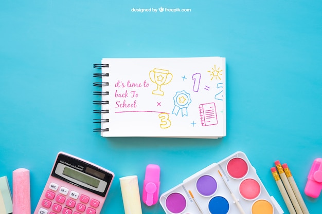 Back to school mockup with notepad and chalk PSD Template
