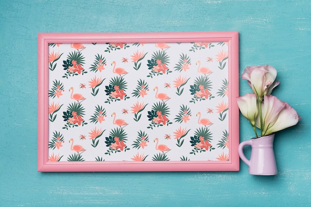 Download Free PSD | Beautiful frame mockup with floral decoration