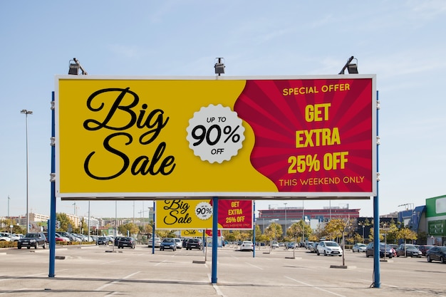 Billboard mockup at parking lot Free Psd