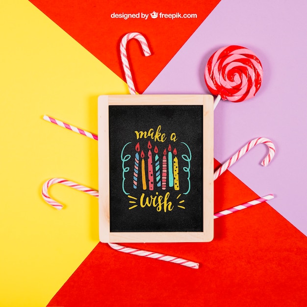 Download Free PSD | Birthday mockup with slate and candy