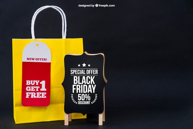 Download Free Psd Black Friday Mockup With Board And Yellow Bag