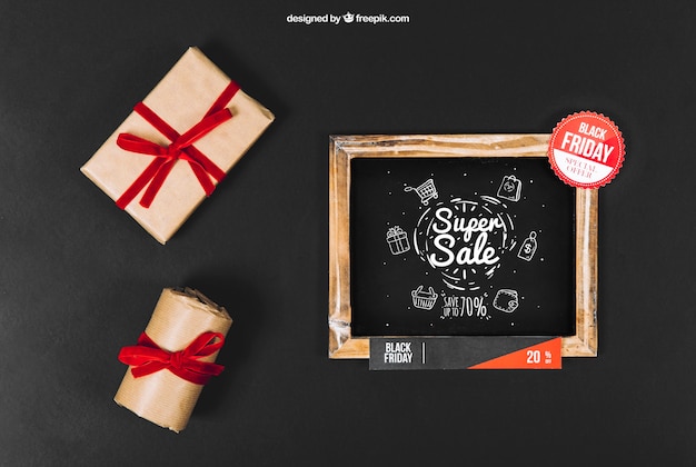 Download Black friday mockup with slate and gift boxes | Free PSD File