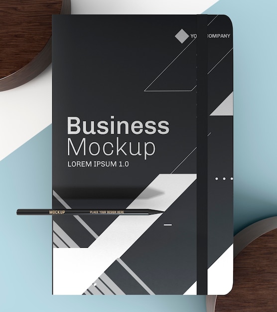 Download Free PSD | Black notebook and pencil mock-up