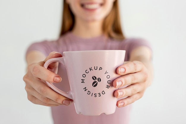 Blonde woman with coffee mug mock-up Free Psd