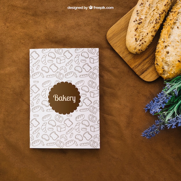 Download Book cover mockup with bread and flowers PSD file | Free Download