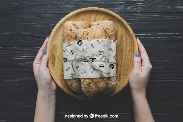 Free PSD | Bread mockup on board