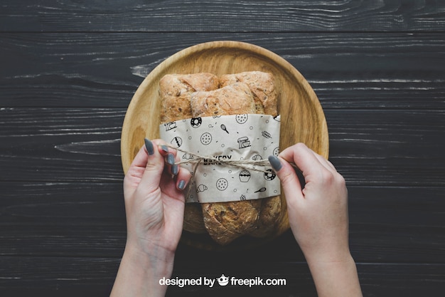 Download Bread mockup with hands | Free PSD File