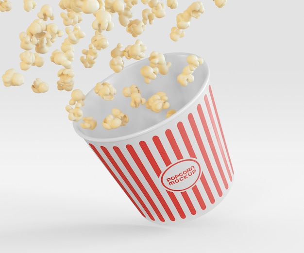 Free PSD | Bucket with popcorn flying mockup