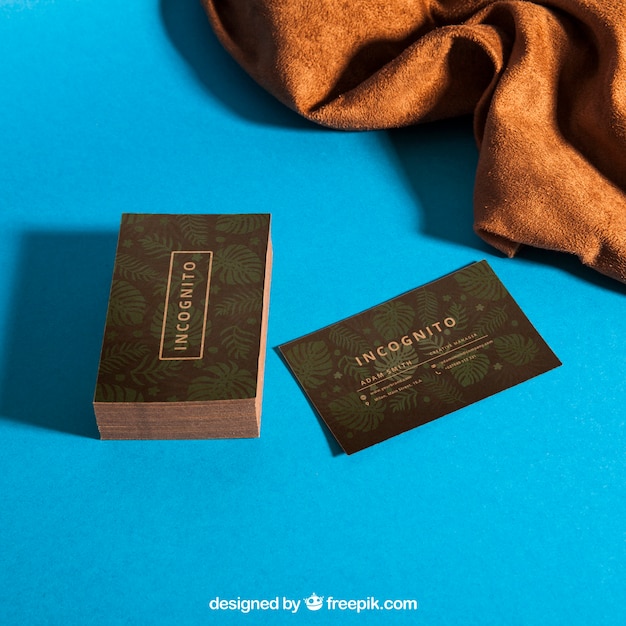 Download Business card mockup with textile | Free PSD File