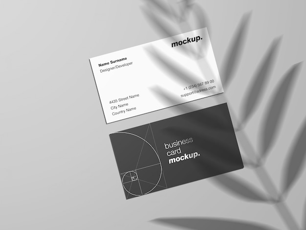 Download Premium PSD | Business cards mockup template with palm leaf shadow overlay