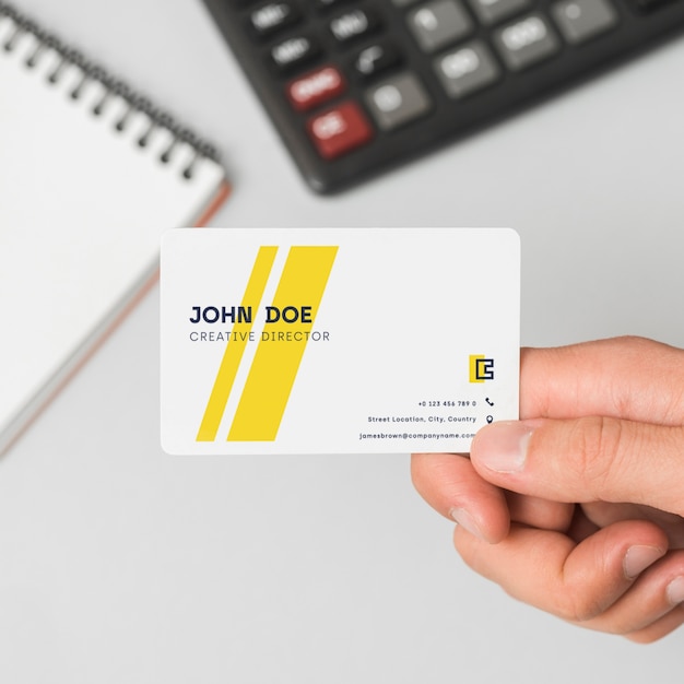 Download Free Psd Businessman With Business Card Mockup Yellowimages Mockups