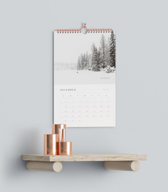 Download Free PSD | Calendar hookes on wall above shelf mock-up