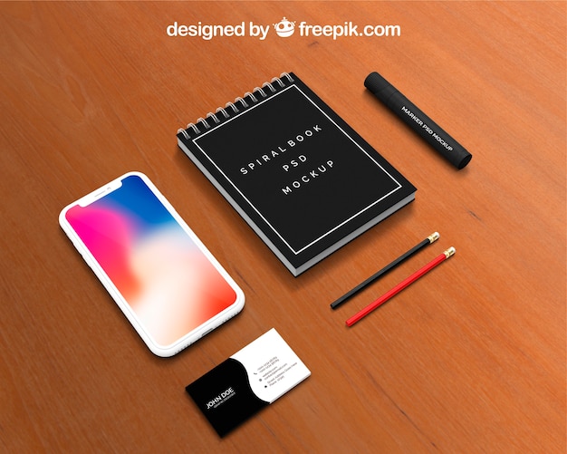 Calendar and smartphone mockup on workspace PSD Template