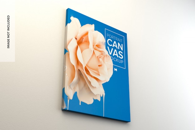 Download Premium PSD | Canvas mockup hanging on the wall