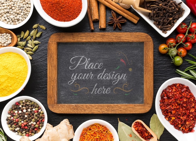 Download Chalkboard with wooden frame mock-up surrounded by spices ...