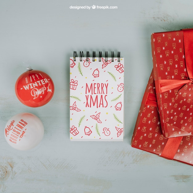 Download Christmas mockup with notepad and gift boxes PSD file ... PSD Mockup Templates