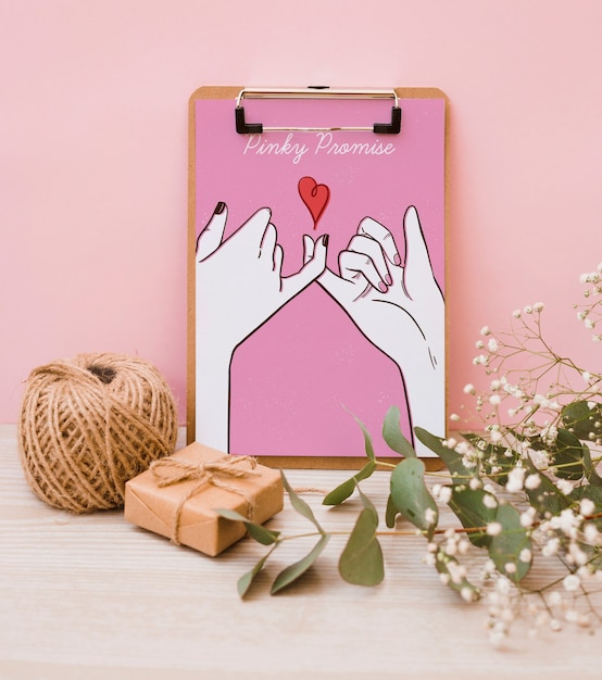 Download Clipboard mockup with floral decoration | Free PSD File